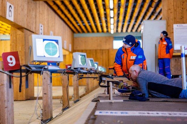 Photo of the shooting range and monitors at the Biathlon guest shooting