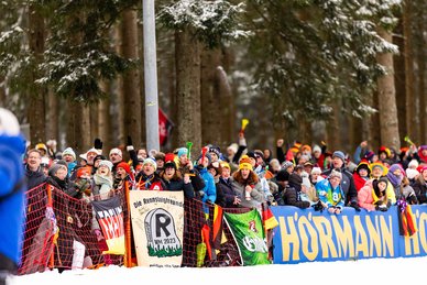 Cheering fans on the track at the biathlon in Oberhof.